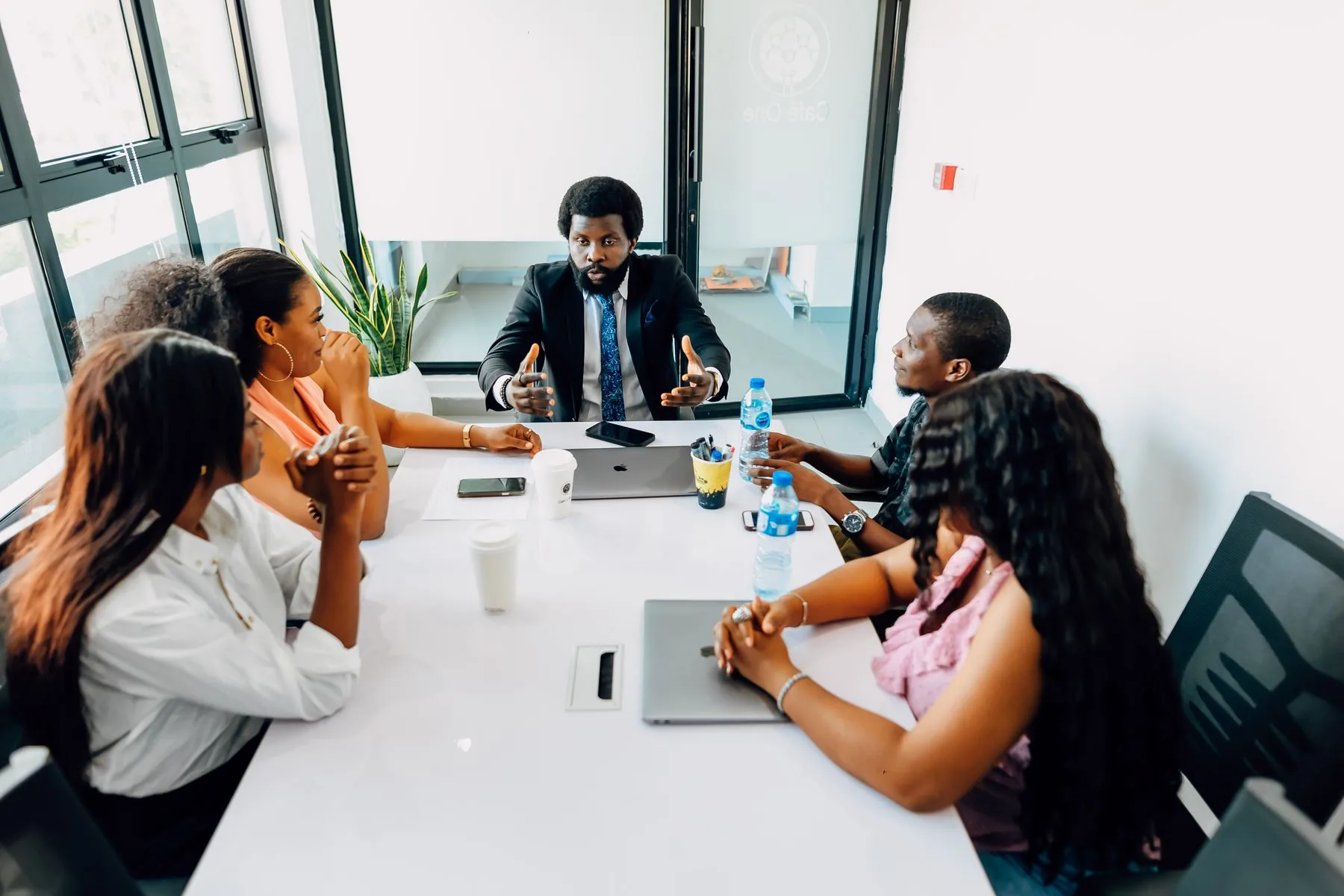 Operations team collaborating in a modern Lagos boardroom
